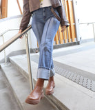 Jeans con risvolti alti