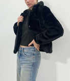 Pelliccia con cappuccio