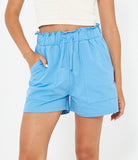 Shorts con arriccio in vita